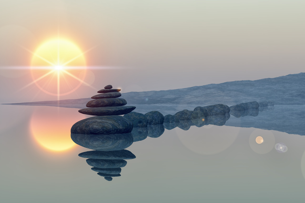 lake with stacked stones